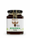 Tarro pequeño y cuadrado de miel ecológica de Roble de la marca Ecoflor con etiqueta blanca y logotipo dorado sobre fondo blanco.