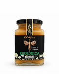 Tarro pequeño y cuadrado de miel ecológica de Calluna de la marca Ecoflor con etiqueta negra y logotipo dorado sobre fondo blanco.