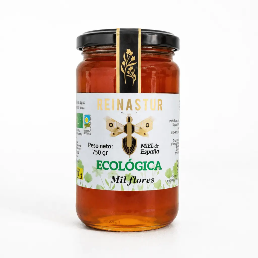 Tarro de 750 gramos de miel ecológica de Milflores Reinastur con precinto negro y detalles florales sobre fondo blanco.